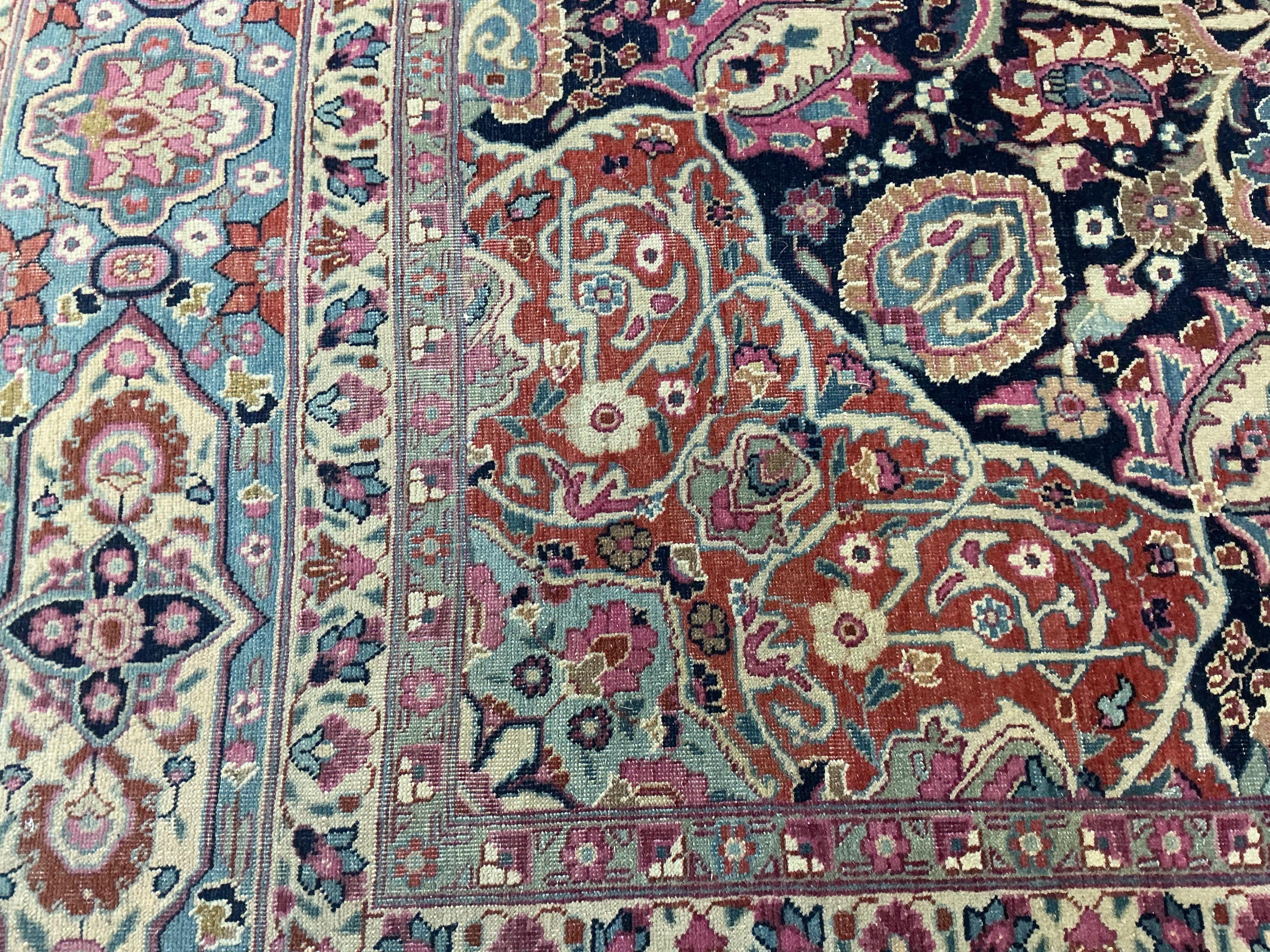 An early 20th century Kashan blue ground carpet, 315 x 206cm